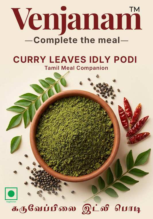 Venjanam Curry Leaves Idly Podi packaging with green powder, leaves, and spices on a beige background.