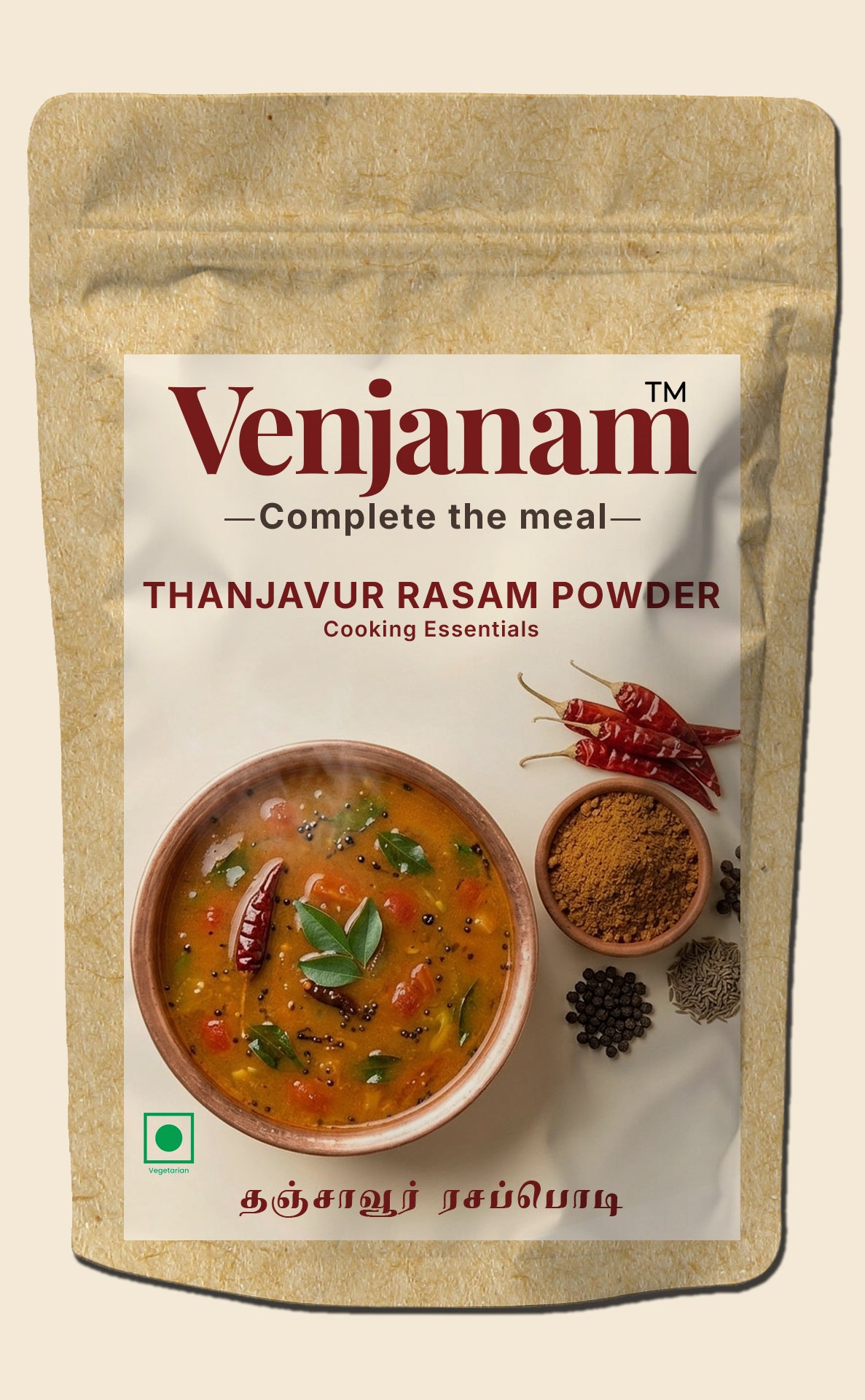 Venjanam Thanjavur Rasam Powder packaging with a bowl of rasam and spices on a beige background