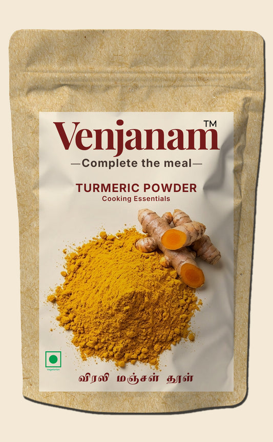 Venjanam turmeric powder packaging with turmeric roots on a beige background