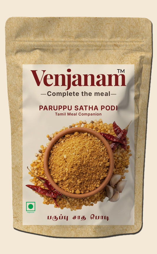 Venjanam Paruppu Satha Podi packaging with a bowl of spice and chili peppers on a beige background