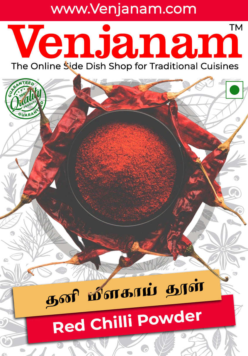 An overhead shot showcasing a black bowl filled with vibrant Venjanam Red Chilli Powder, encircled by dried red chilies. This high-quality red chili powder is ideal for adding authentic flavor and heat to traditional Indian cuisines. The image features the "Quality Guaranteed" seal and highlights "தனி மிளகாய் தூள்" (Thani Milagai Thool in Tamil) and "Red Chilli Powder".